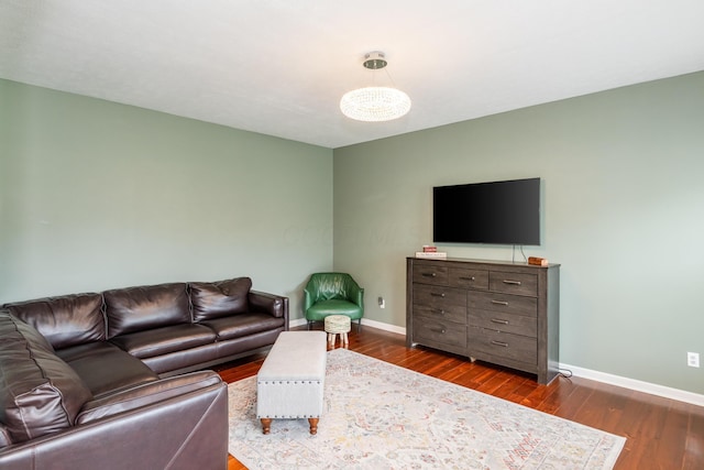 9950 Stonemead Way, Dayton, OH 45458 - living area featuring dark wood-style floors and baseboards