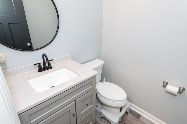 9950 Stonemead Way, Dayton, OH 45458 - half bath featuring vanity and wood finished floors