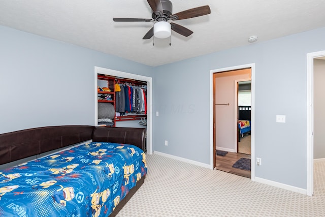 9950 Stonemead Way, Dayton, OH 45458 - bedroom featuring a ceiling fan, a closet, and carpet floors