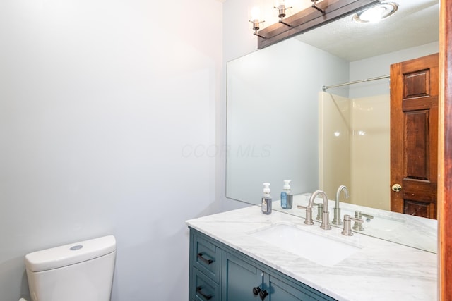 9950 Stonemead Way, Dayton, OH 45458 - bathroom featuring vanity and a textured ceiling