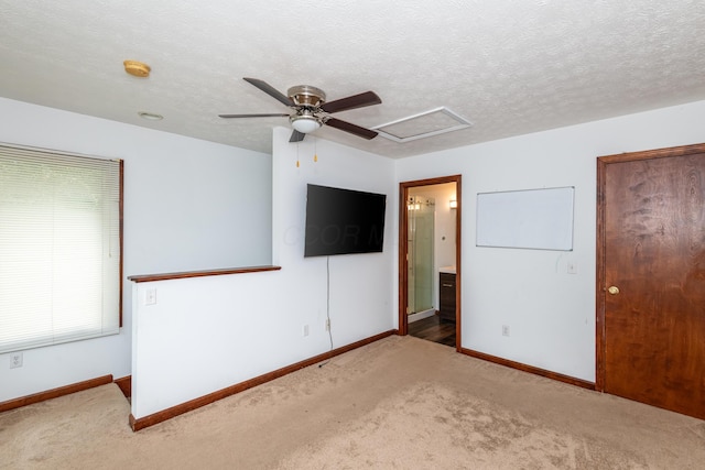 9950 Stonemead Way, Dayton, OH 45458 - unfurnished bedroom with carpet flooring, connected bathroom, and ceiling fan