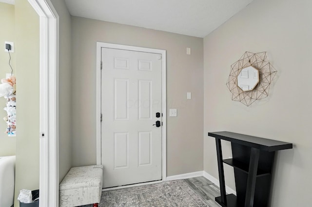 5346 Calypso Cascades Dr, Dublin, OH 43016 - foyer with light wood finished floors and baseboards