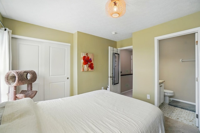 5346 Calypso Cascades Dr, Dublin, OH 43016 - carpeted bedroom featuring a closet and ensuite bath