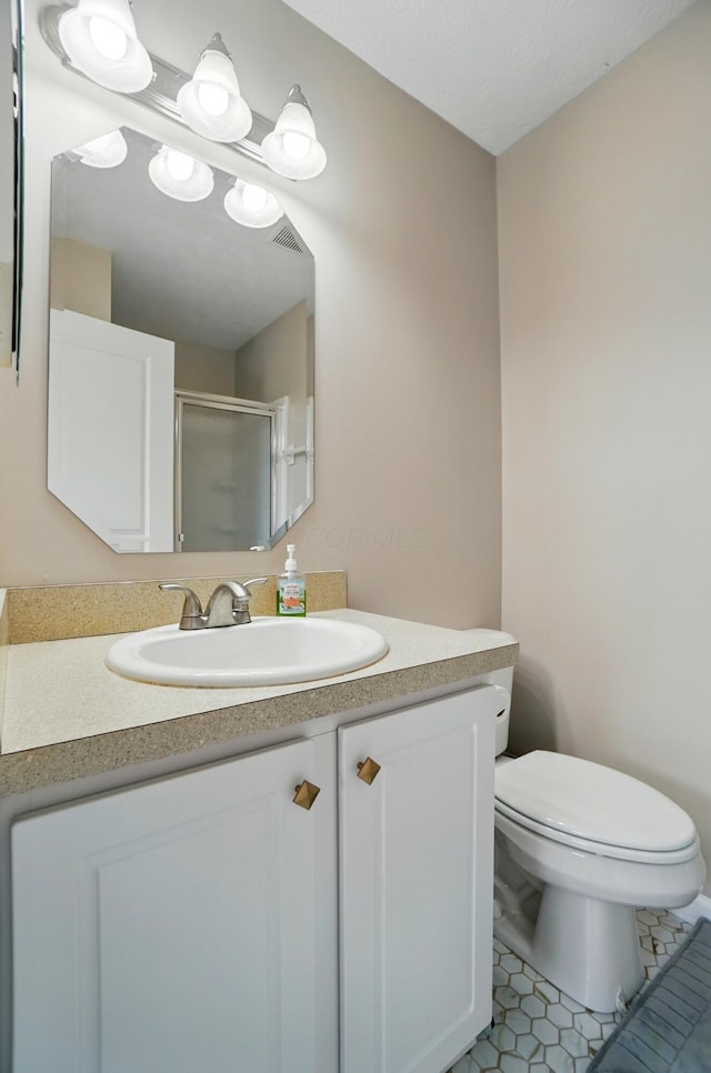 5346 Calypso Cascades Dr, Dublin, OH 43016 - full bath featuring vanity, a shower with door, and tile patterned flooring