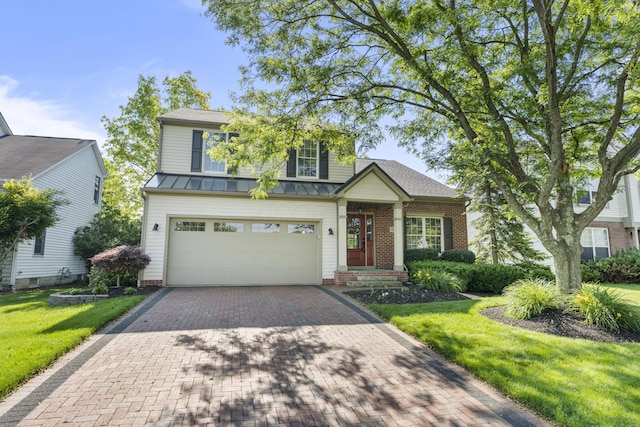 7341 Clancy Way, Westerville, OH 43082 - traditional-style house with a standing seam roof, an attached garage, decorative driveway, a front lawn, and a metal roof