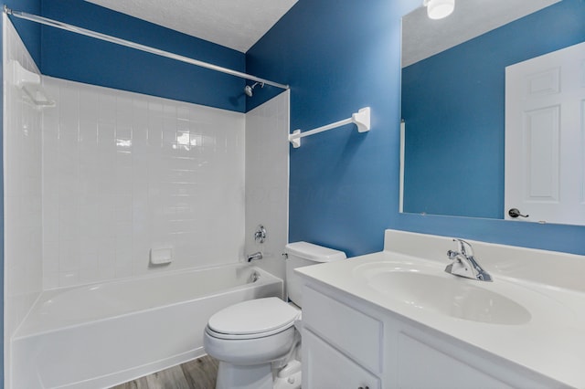 7341 Clancy Way, Westerville, OH 43082 - full bath with bathing tub / shower combination, vanity, wood finished floors, and a textured ceiling