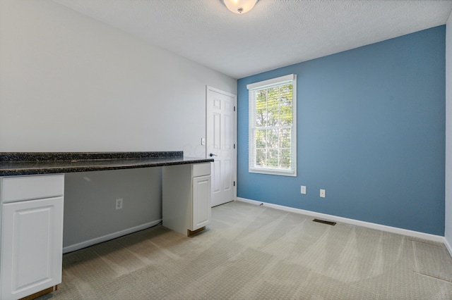 7341 Clancy Way, Westerville, OH 43082 - unfurnished bedroom featuring light carpet and a textured ceiling