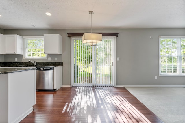 7341 Clancy Way, Westerville, OH 43082 - kitchen featuring dishwasher, white cabinetry, dark wood finished floors, decorative light fixtures, and a textured ceiling
