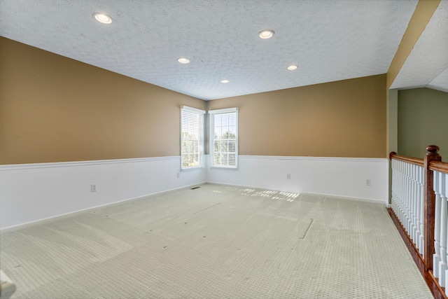 7341 Clancy Way, Westerville, OH 43082 - carpeted empty room with a textured ceiling and recessed lighting