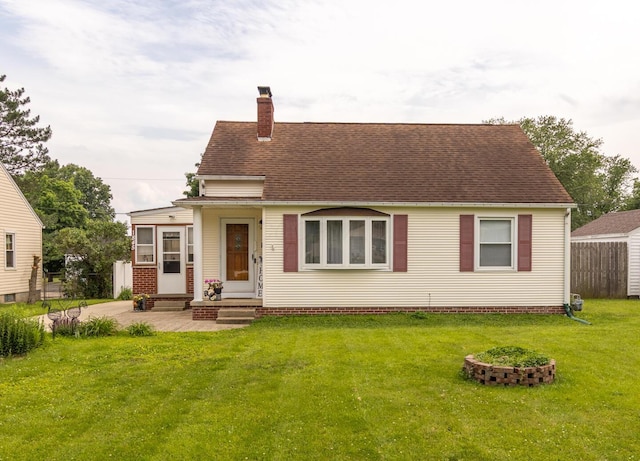 1845 N Columbus St, Lancaster, OH 43130 - back of house featuring a chimney, entry steps, a patio, and roof with shingles