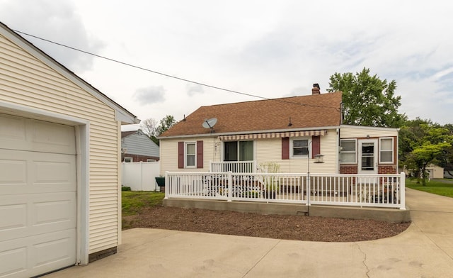 1845 N Columbus St, Lancaster, OH 43130 - view of front of property with a garage and a chimney