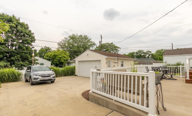 1845 N Columbus St, Lancaster, OH 43130 - view of patio with an outbuilding, a detached garage, and outdoor dining area