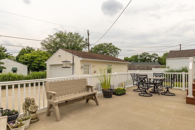 1845 N Columbus St, Lancaster, OH 43130 - view of patio featuring outdoor dining area, an outdoor structure, and a garage