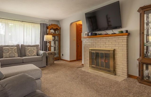 1845 N Columbus St, Lancaster, OH 43130 - carpeted living area with arched walkways and a brick fireplace