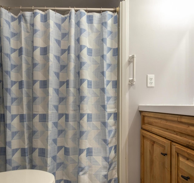 1845 N Columbus St, Lancaster, OH 43130 - bathroom with vanity and curtained shower