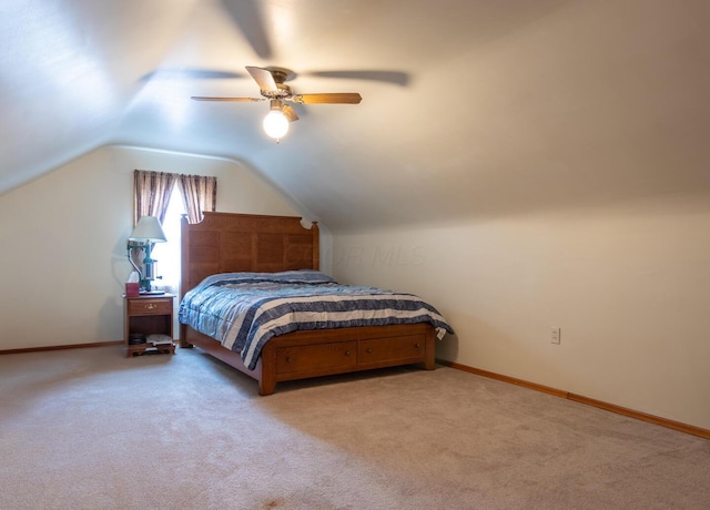 1845 N Columbus St, Lancaster, OH 43130 - bedroom with vaulted ceiling, carpet floors, and a ceiling fan