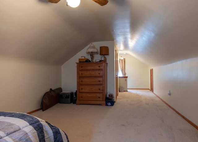 1845 N Columbus St, Lancaster, OH 43130 - bedroom featuring light colored carpet, vaulted ceiling, and a ceiling fan