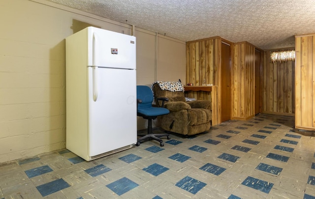 1845 N Columbus St, Lancaster, OH 43130 - living area with tile patterned floors and concrete block wall