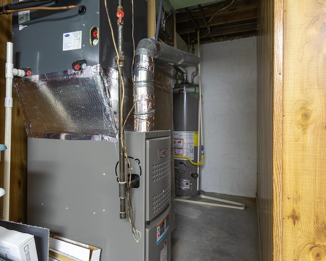 1845 N Columbus St, Lancaster, OH 43130 - utility room featuring gas water heater and heating unit