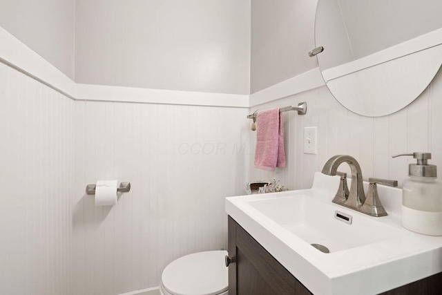 405 N Union St, Galion, OH 44833 - bathroom with vanity and a wainscoted wall