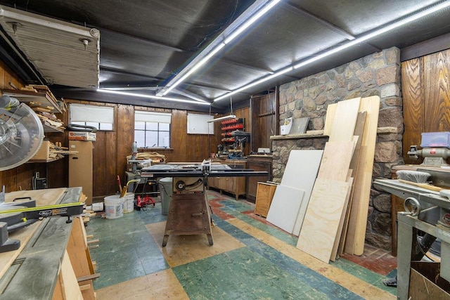 405 N Union St, Galion, OH 44833 - basement with wooden walls, a workshop area, and tile patterned floors