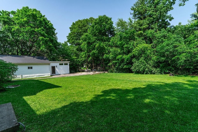 405 N Union St, Galion, OH 44833 - view of green lawn featuring a patio area