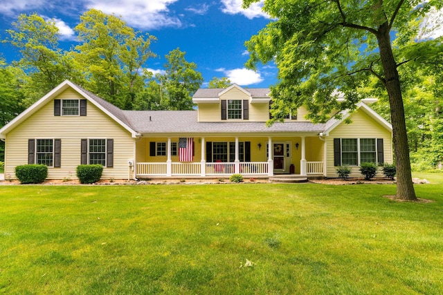 4563 Donithen Rd, Marion, OH 43302 - traditional-style house featuring covered porch, a front yard, and a shingled roof