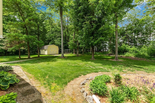 4563 Donithen Rd, Marion, OH 43302 - view of green lawn with a storage unit
