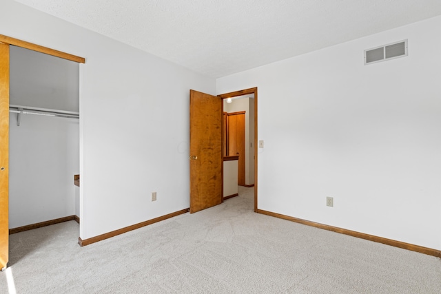 9 Intermeadows Way, Powell, OH 43065 - unfurnished bedroom featuring carpet flooring and a closet