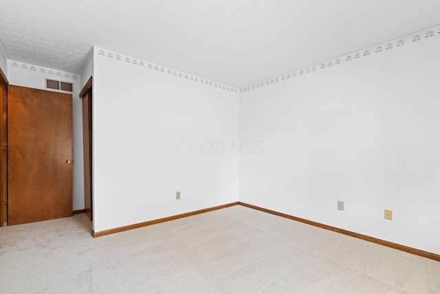 9 Intermeadows Way, Powell, OH 43065 - unfurnished room featuring carpet floors and a textured ceiling