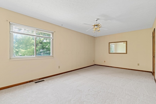 9 Intermeadows Way, Powell, OH 43065 - unfurnished room featuring light carpet, a textured ceiling, and ceiling fan