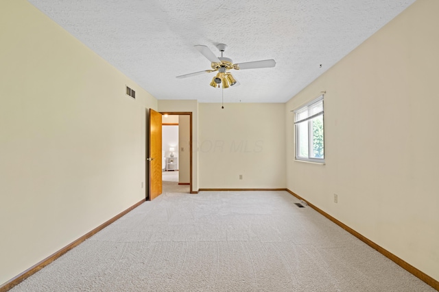 9 Intermeadows Way, Powell, OH 43065 - empty room featuring ceiling fan, light colored carpet, and a textured ceiling