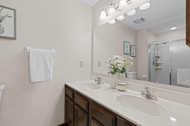 9 Intermeadows Way, Powell, OH 43065 - bathroom featuring double vanity and a shower stall