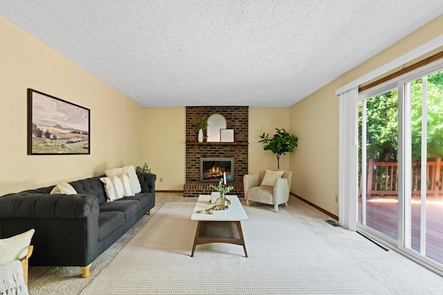 9 Intermeadows Way, Powell, OH 43065 - living area with a textured ceiling, a brick fireplace, and light colored carpet