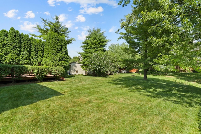 9 Intermeadows Way, Powell, OH 43065 - view of grassy yard featuring a wooden deck