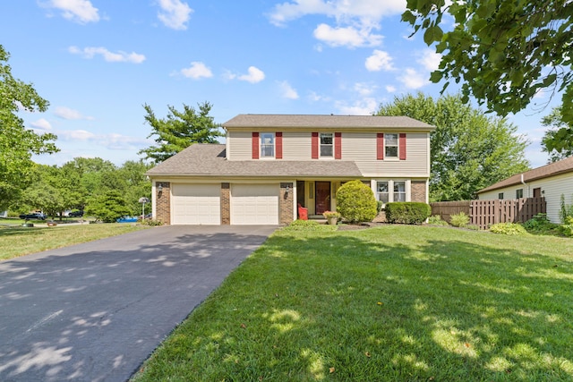 9 Intermeadows Way, Powell, OH 43065 - view of front of house featuring brick siding, a garage, and driveway