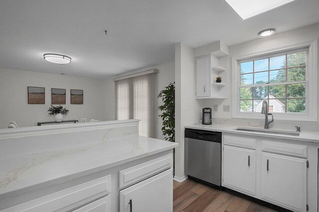 764 Towne Krier Ct, Newark, OH 43055 - kitchen featuring dishwasher, dark wood finished floors, light countertops, and white cabinets