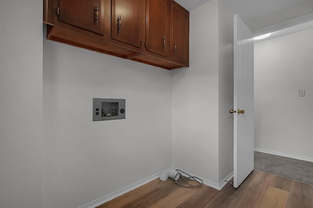 764 Towne Krier Ct, Newark, OH 43055 - laundry room featuring hookup for a washing machine, wood finished floors, and cabinet space
