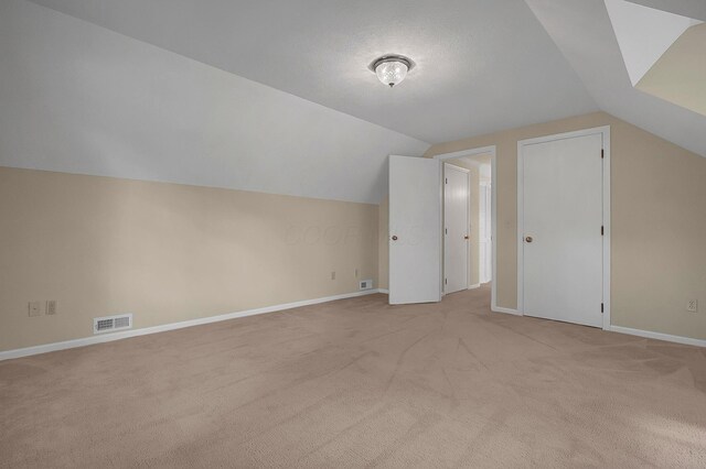 764 Towne Krier Ct, Newark, OH 43055 - bonus room featuring light colored carpet and lofted ceiling
