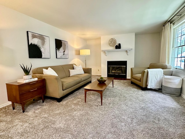 764 Towne Krier Ct, Newark, OH 43055 - carpeted living area with a glass covered fireplace and baseboards