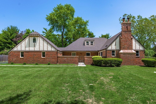 1120 Fairway Blvd, Columbus, OH 43213 - back of property featuring a chimney and brick siding