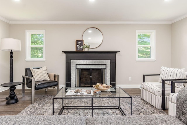 1120 Fairway Blvd, Columbus, OH 43213 - living room with wood finished floors, ornamental molding, a fireplace, healthy amount of natural light, and recessed lighting