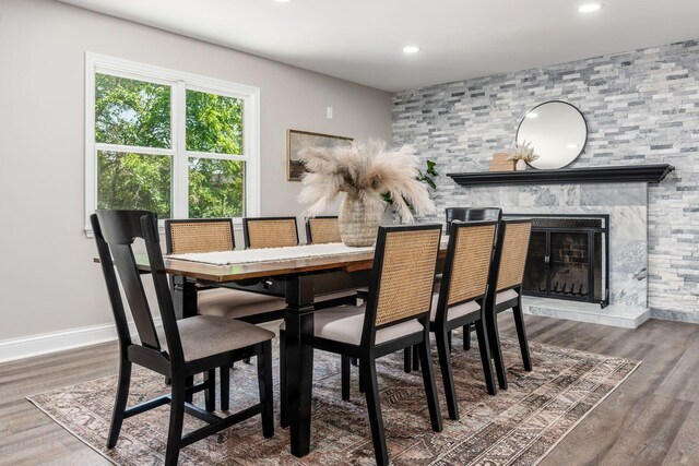 1120 Fairway Blvd, Columbus, OH 43213 - dining area with a stone fireplace, recessed lighting, and wood finished floors