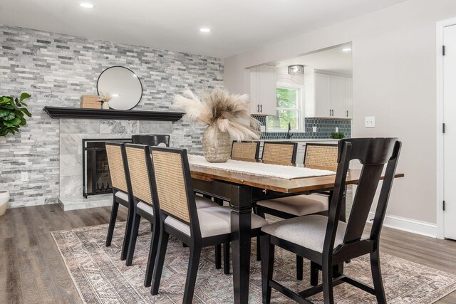 1120 Fairway Blvd, Columbus, OH 43213 - dining area with wood finished floors, recessed lighting, and a fireplace