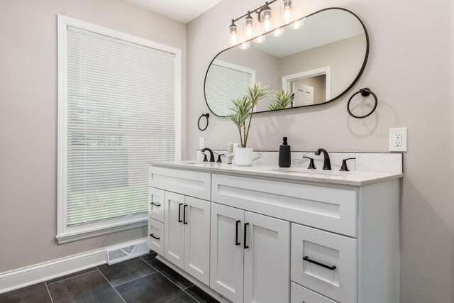 1120 Fairway Blvd, Columbus, OH 43213 - full bath featuring double vanity and baseboards