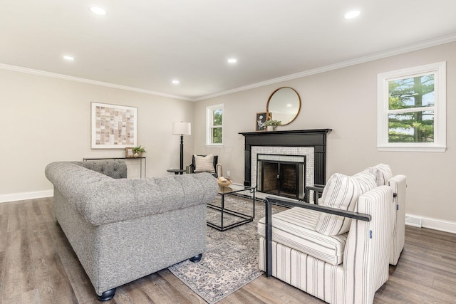 1120 Fairway Blvd, Columbus, OH 43213 - living area with healthy amount of natural light, wood finished floors, crown molding, and recessed lighting