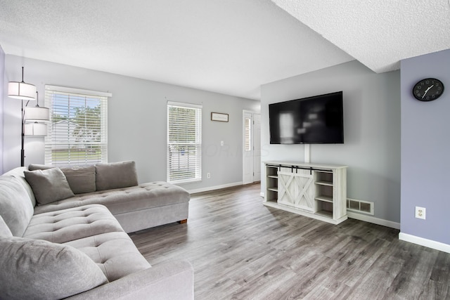 3124 Hillrose Dr, Hilliard, OH 43026 - living room with wood finished floors and a textured ceiling