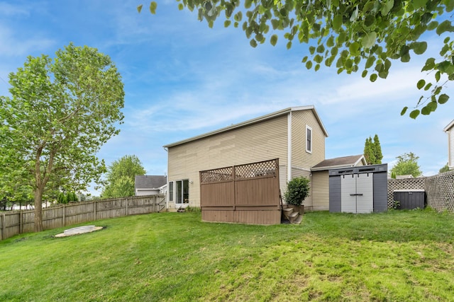 3124 Hillrose Dr, Hilliard, OH 43026 - back of house featuring a fenced backyard and a storage shed