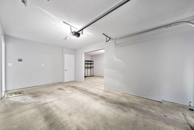 1364 Robinof Dr, Grove City, OH 43123 - garage featuring a garage door opener
