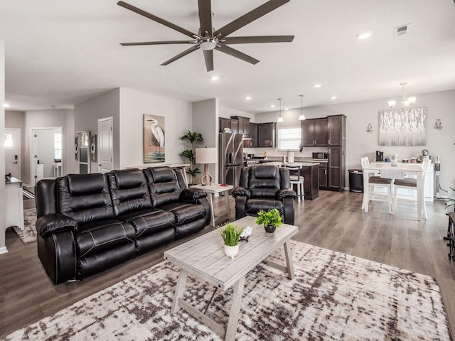 326 Mannaseh Dr W, Granville, OH 43023 - living room featuring ceiling fan, a chandelier, wood finished floors, and recessed lighting